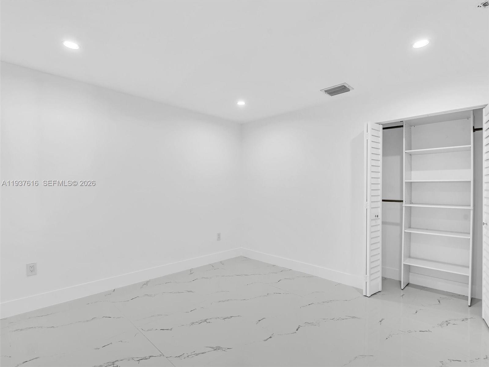 3354 Northwest 50th Street, Unit 3354 Miami, FL 33142 - Photo 18 of 26 a view of an empty room