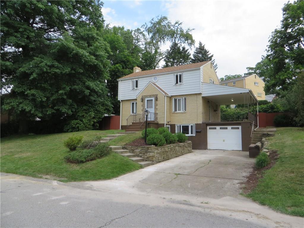 137 Poplar Ridge Road Penn Hills, PA 15235 - Photo 1 of 25 Front view with large driveway and nice front yard