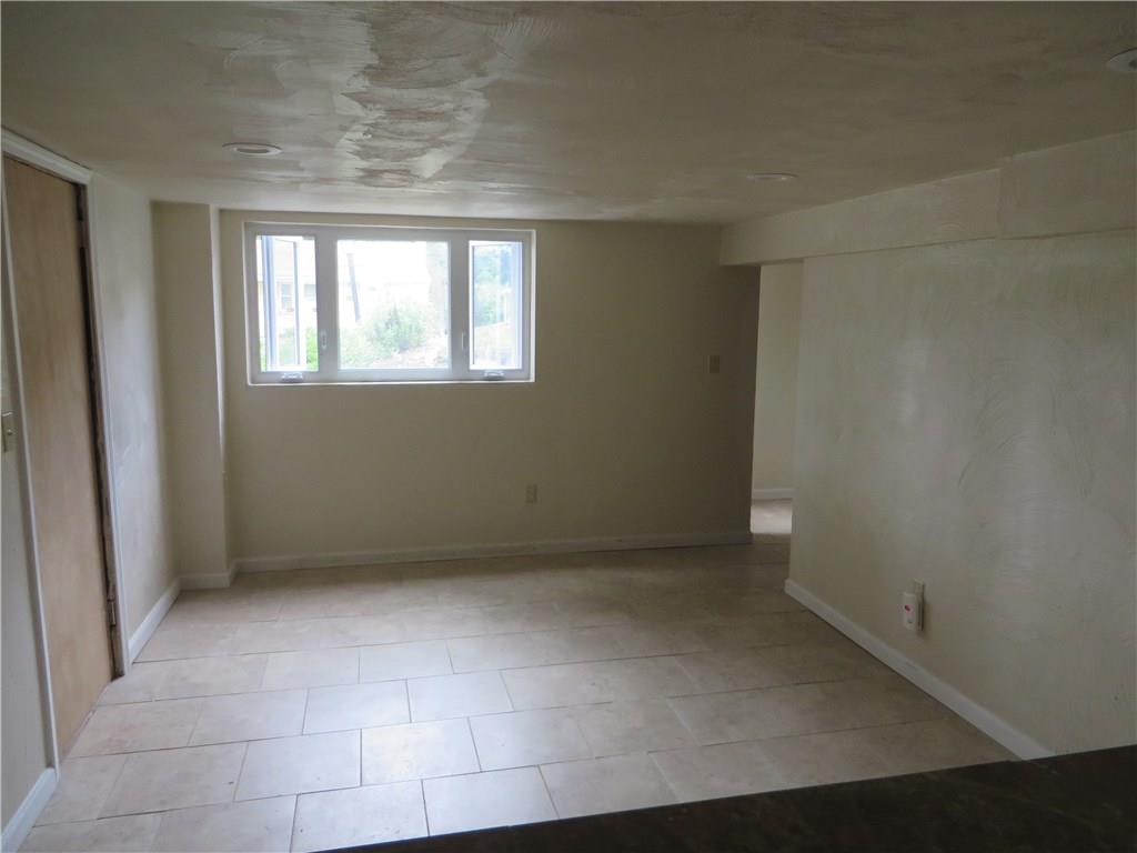 137 Poplar Ridge Road Penn Hills, PA 15235 - Photo 14 of 25 Another shot of the game-room with door to garage
