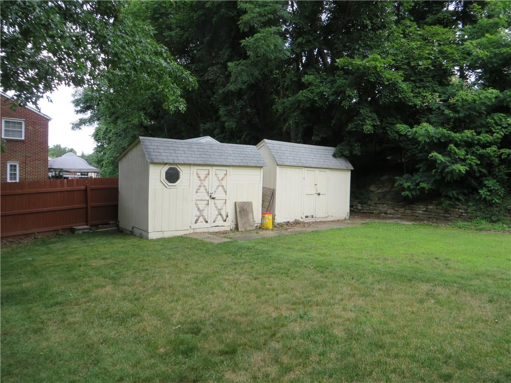 137 Poplar Ridge Road Penn Hills, PA 15235 - Photo 19 of 25 Sheds in corner of flat back yard