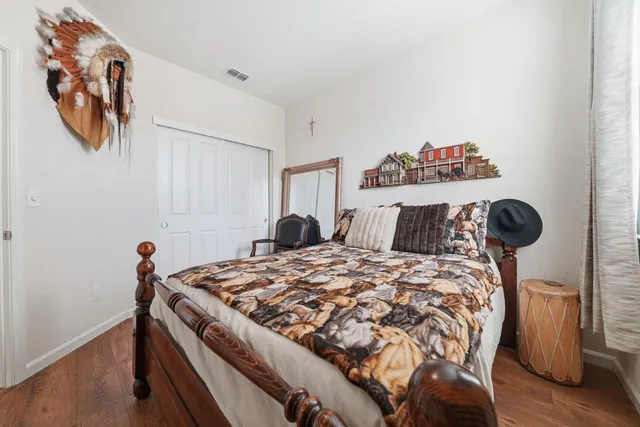 a view of a chairs and table in patio