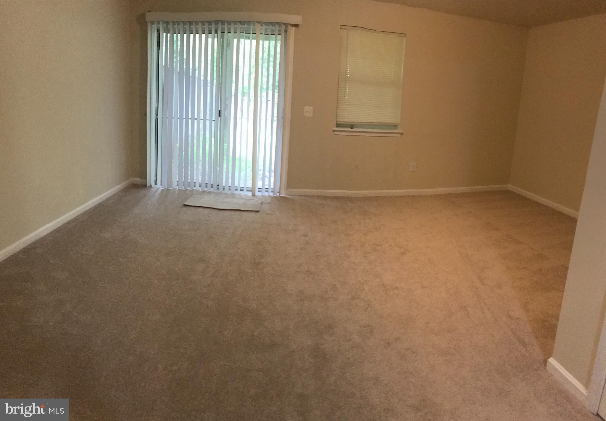 6554 Ridgeborne Drive Rosedale, MD 21237 - Photo 13 of 17 Basement family room with walkout