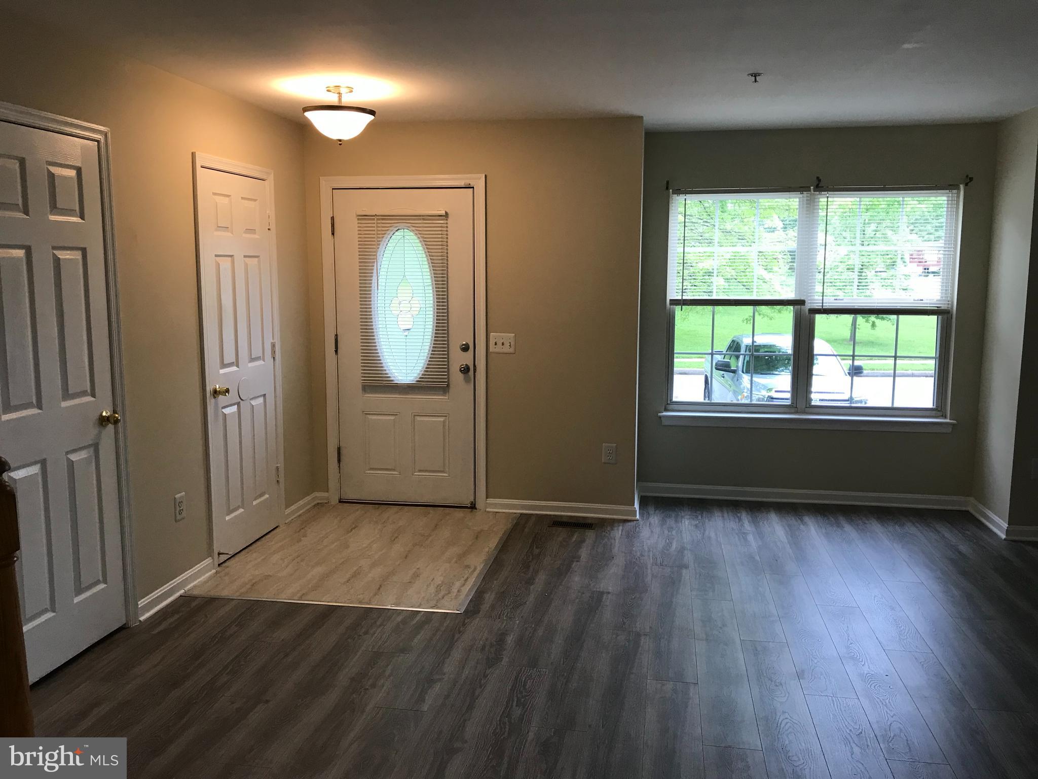 6554 Ridgeborne Drive Rosedale, MD 21237 - Photo 2 of 17 Entranceway/stained glass front door