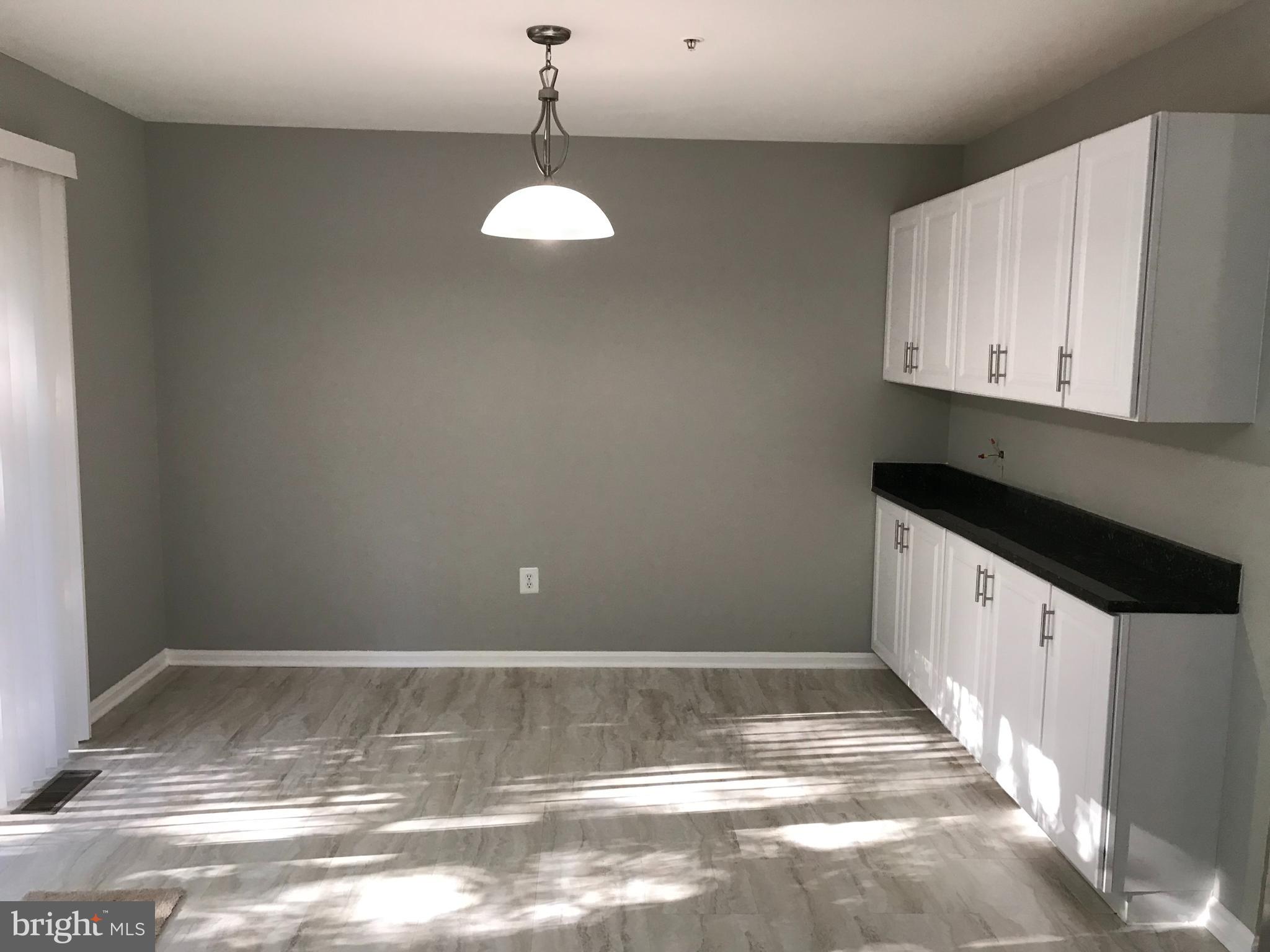 6554 Ridgeborne Drive Rosedale, MD 21237 - Photo 8 of 17 Extra cabinets