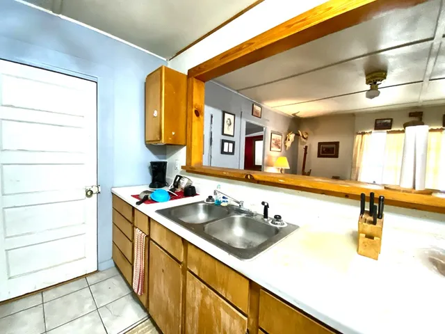 a kitchen with a sink and a cabinets