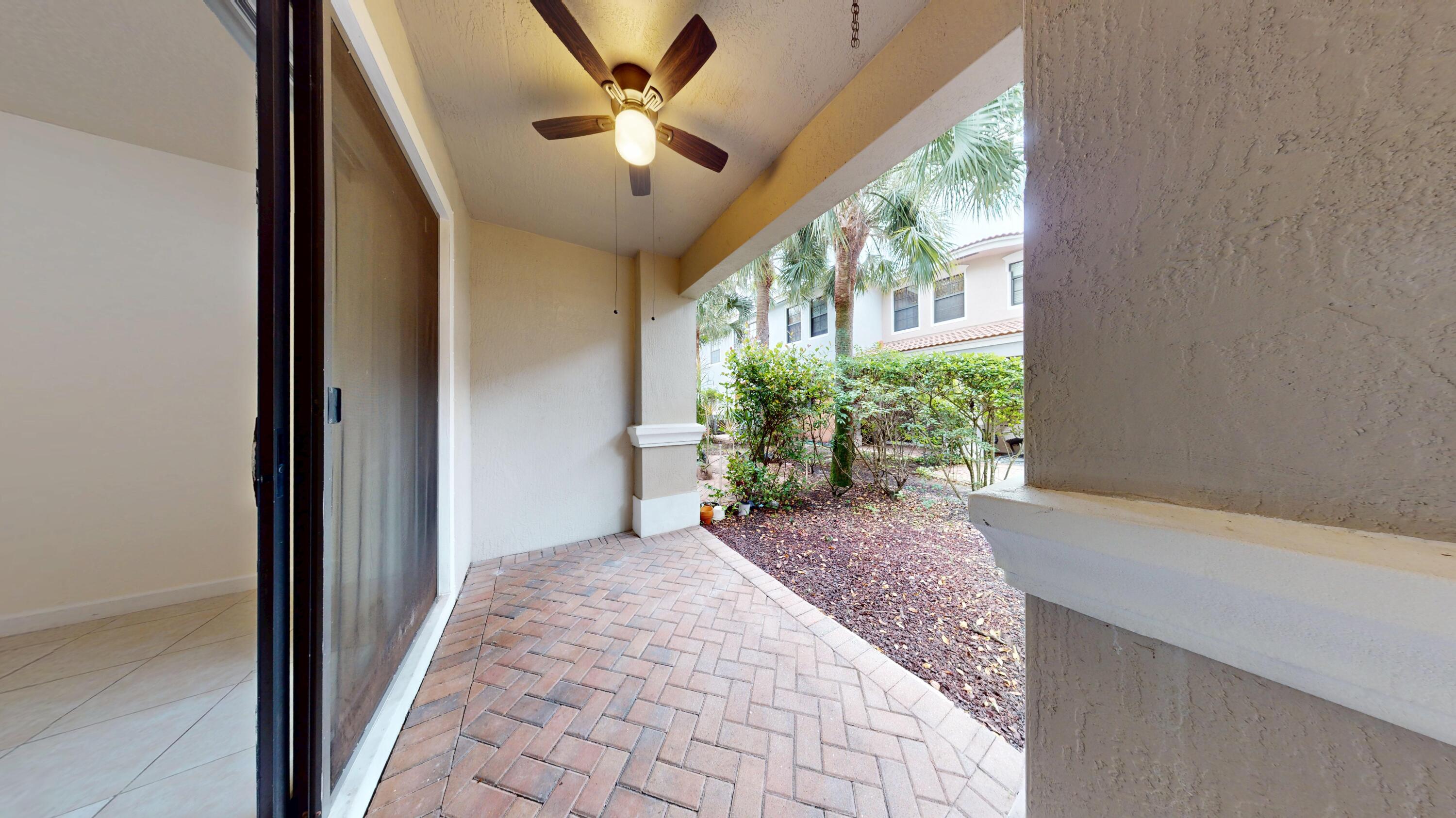 235 Chrystie Circle Delray Beach, FL 33484 - Photo 8 of 27 a view of entryway with a front door