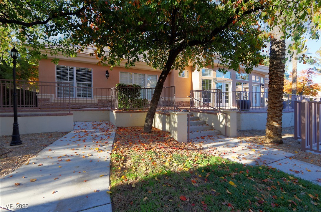 3555 Meridale Drive, Unit 2153 Las Vegas, NV 89147 - Photo 21 of 24 View of front facade with stucco siding