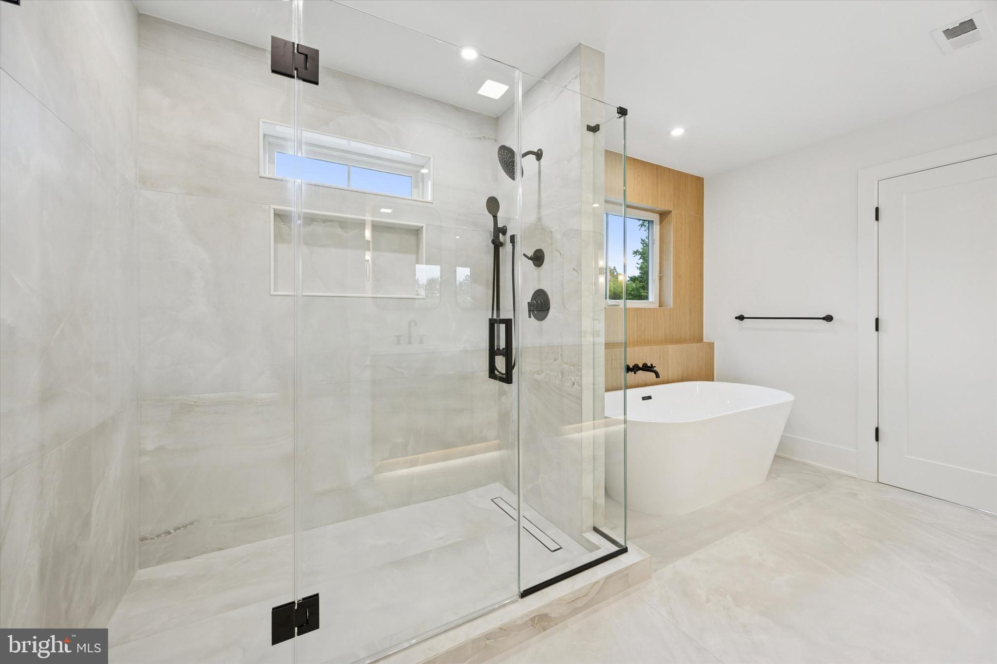 631 Pardee Lane Haddonfield, NJ 08033 - Photo 15 of 37 a spacious bathroom with a bathtub and shower