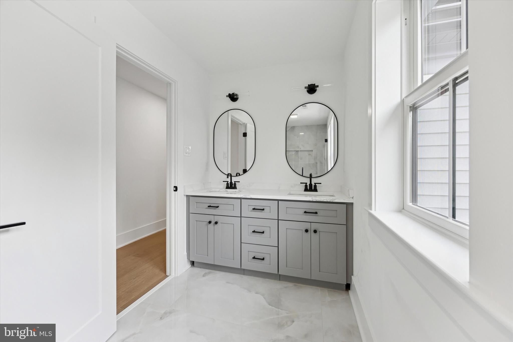 631 Pardee Lane Haddonfield, NJ 08033 - Photo 19 of 37 a view of bathroom with mirror and window