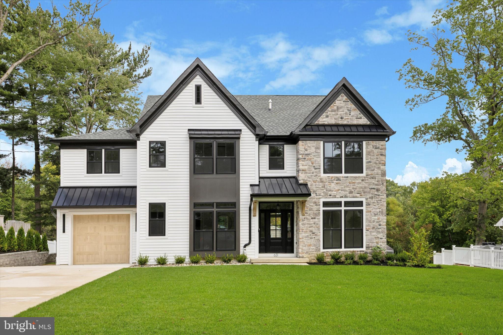 631 Pardee Lane Haddonfield, NJ 08033 - Photo 2 of 37 a front view of a house with a yard and trees