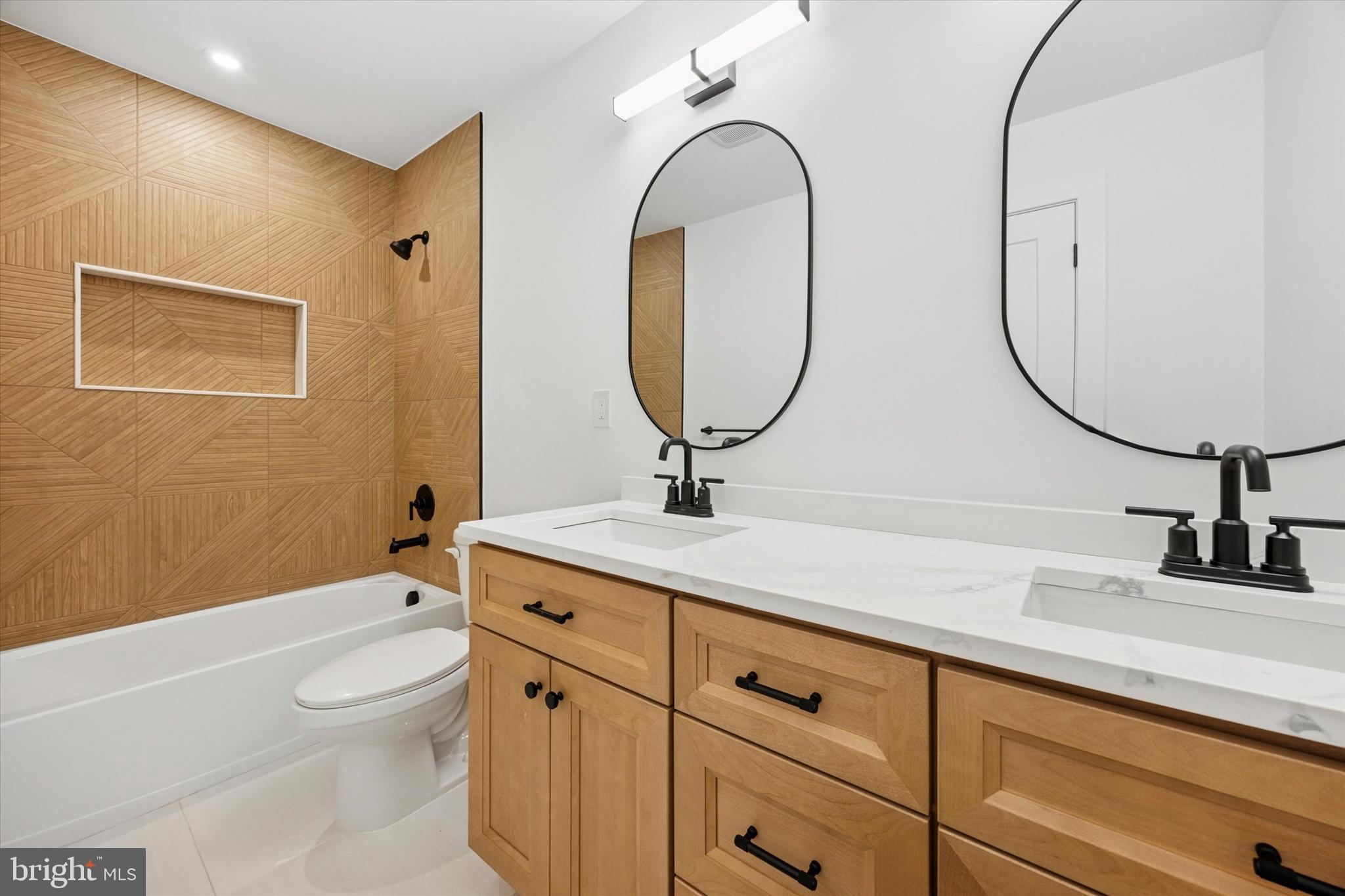 631 Pardee Lane Haddonfield, NJ 08033 - Photo 22 of 37 a bathroom with a toilet a sink and a mirror
