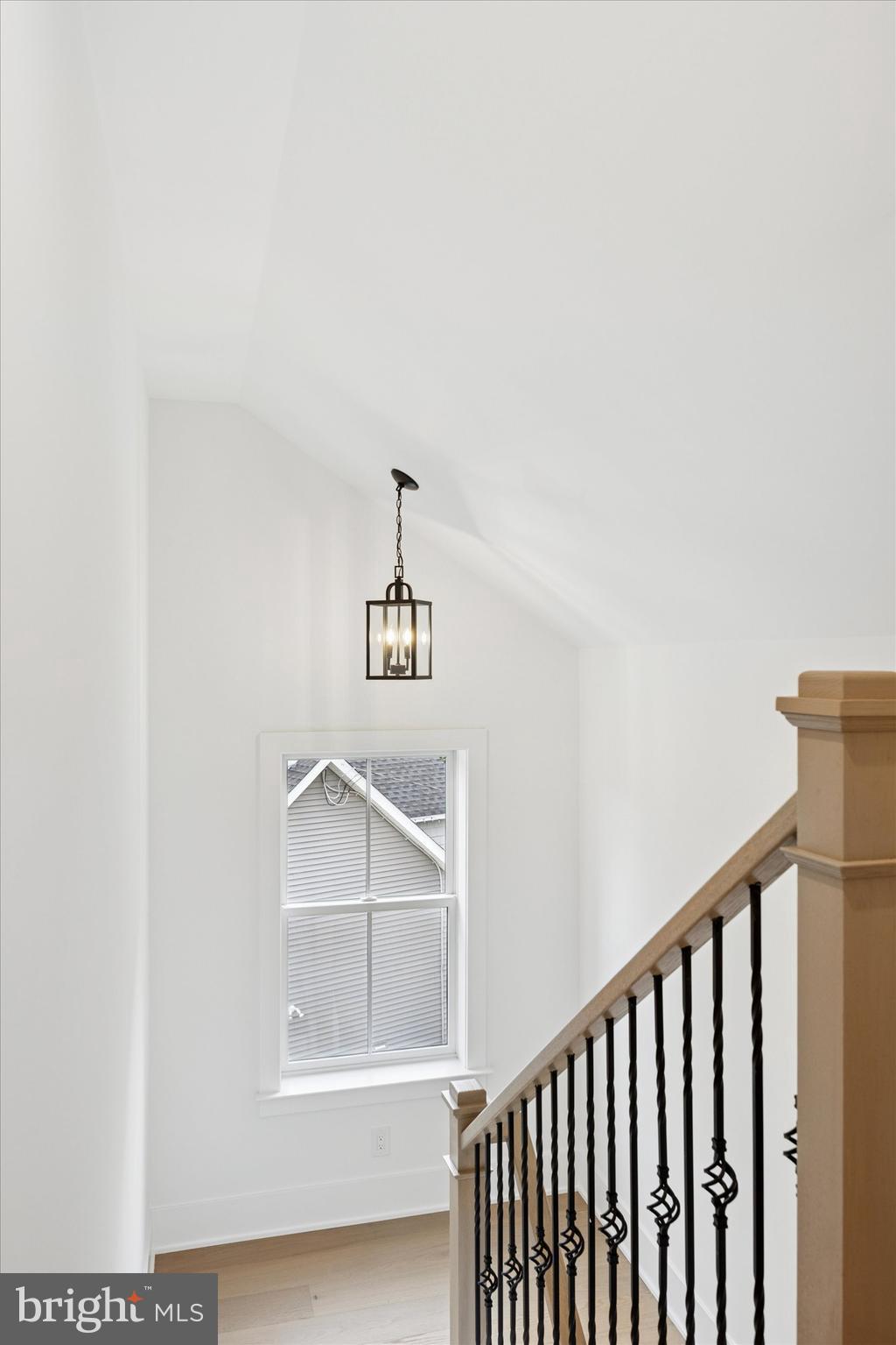 631 Pardee Lane Haddonfield, NJ 08033 - Photo 25 of 37 a view of a hallway with wooden floor and a window