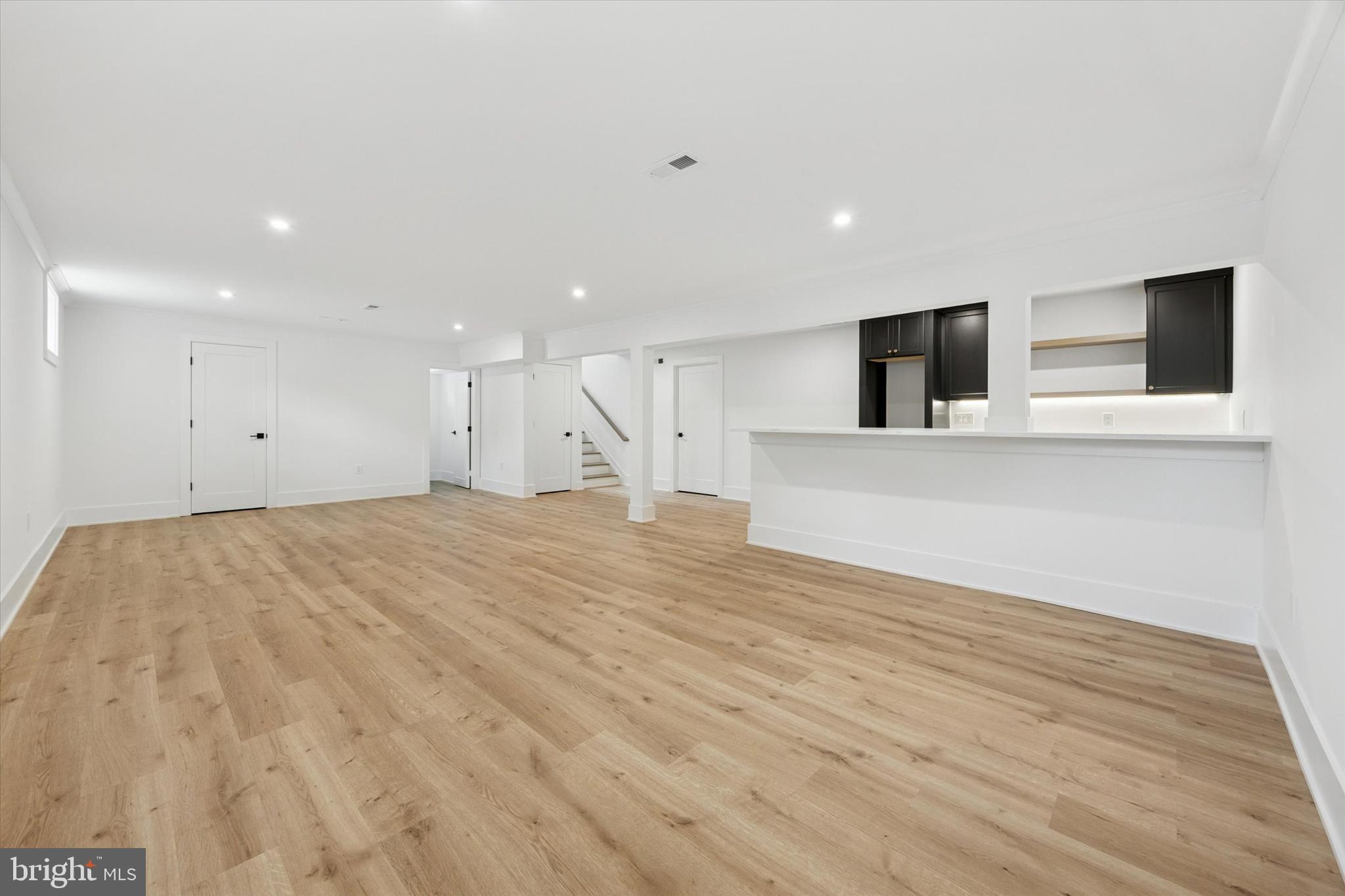 631 Pardee Lane Haddonfield, NJ 08033 - Photo 30 of 37 a view of a big room with wooden floor and windows