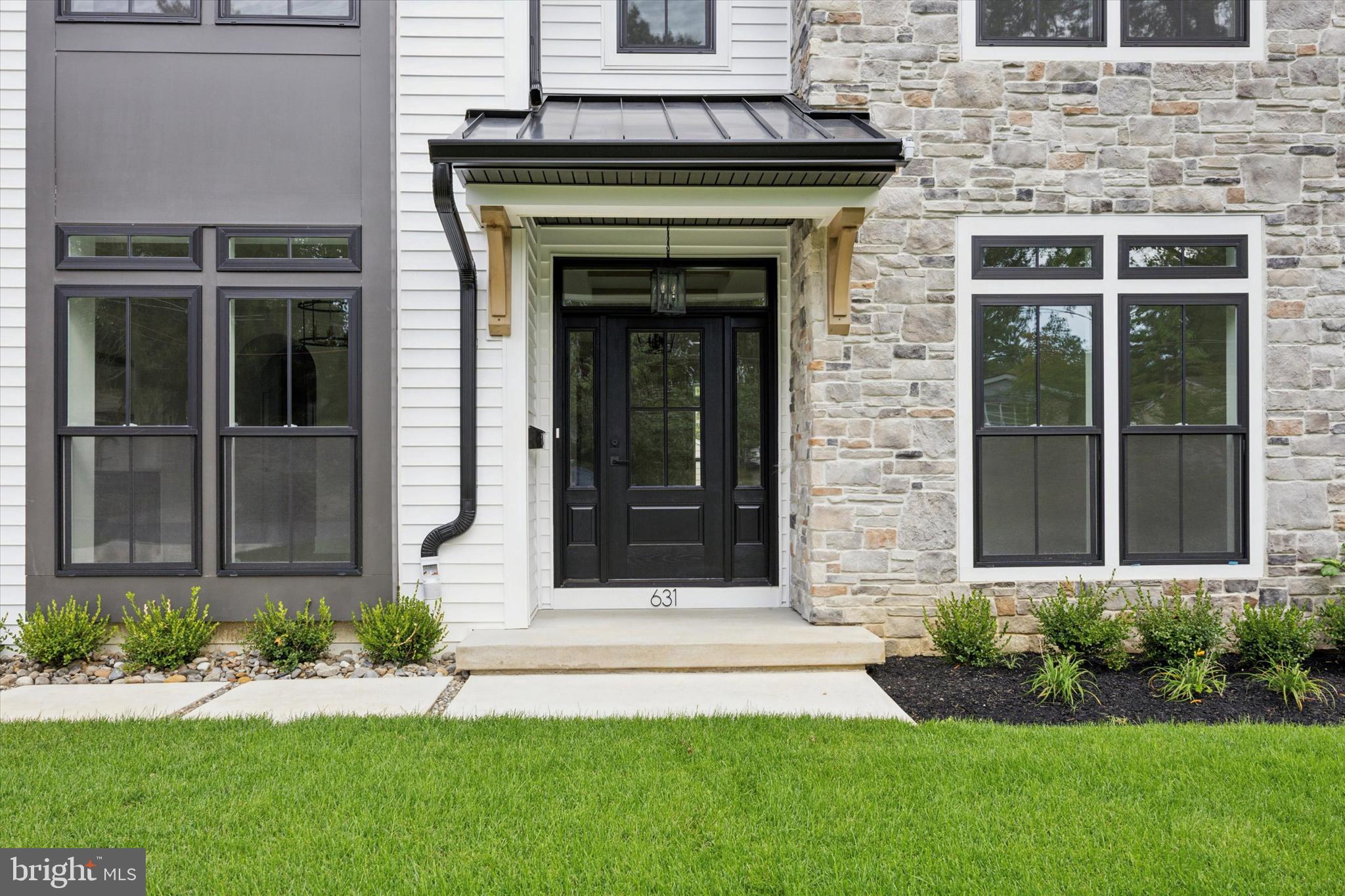 631 Pardee Lane Haddonfield, NJ 08033 - Photo 3 of 37 a front view of a house with a yard