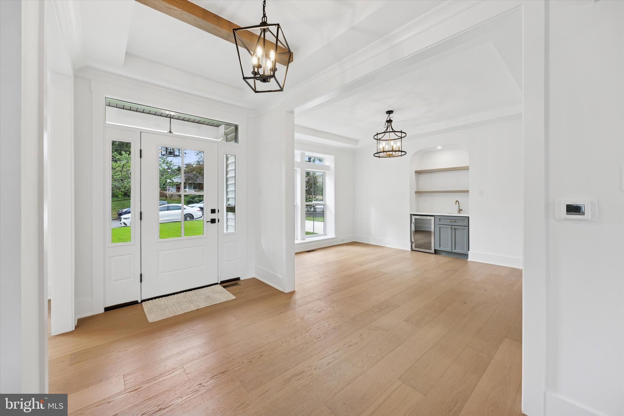 631 Pardee Lane Haddonfield, NJ 08033 - Photo 4 of 37 a view of empty room with wooden floor and windows