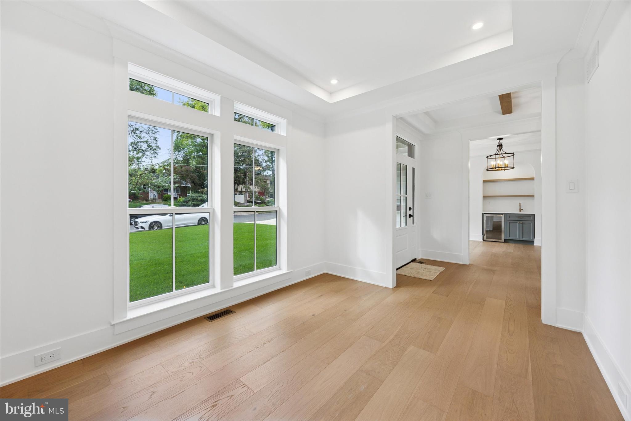631 Pardee Lane Haddonfield, NJ 08033 - Photo 7 of 37 wooden floor in an empty room with a window