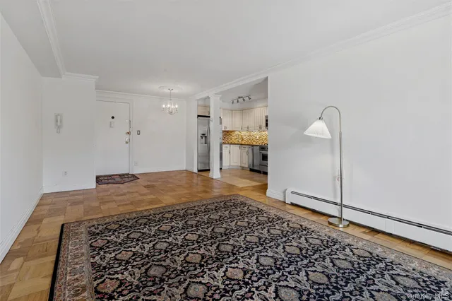 a room with a bed and a stove top oven