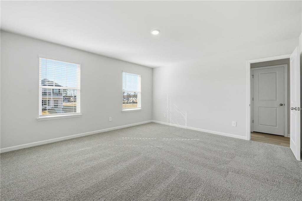 1503 Wild Fox Run Lawrenceville, GA 30045 - Photo 18 of 46 an empty room with windows