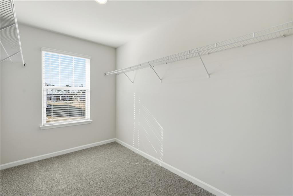 1503 Wild Fox Run Lawrenceville, GA 30045 - Photo 20 of 46 a view of an empty room with a window