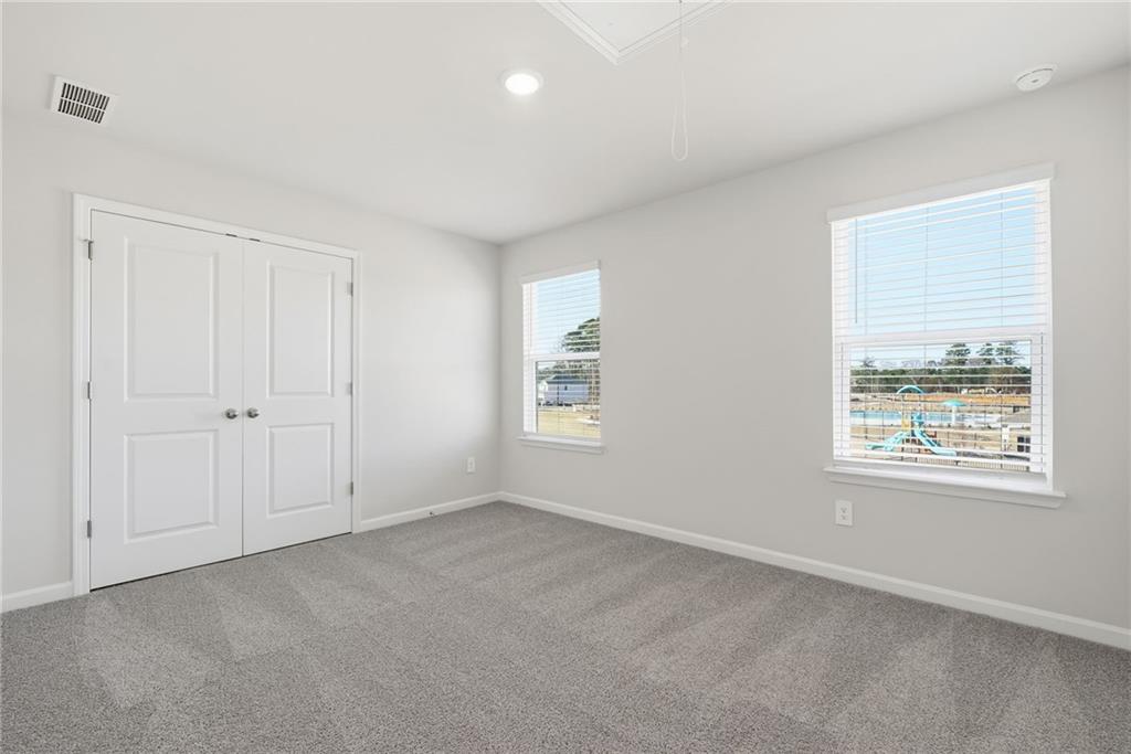 1503 Wild Fox Run Lawrenceville, GA 30045 - Photo 23 of 46 a view of an empty room with a window