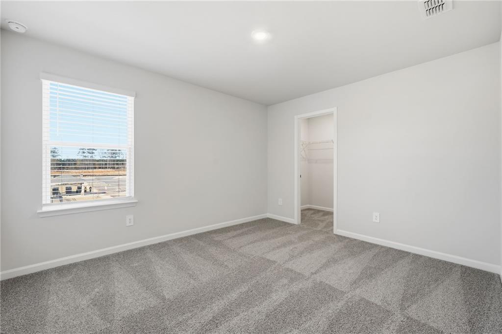 1503 Wild Fox Run Lawrenceville, GA 30045 - Photo 25 of 46 an empty room with a window