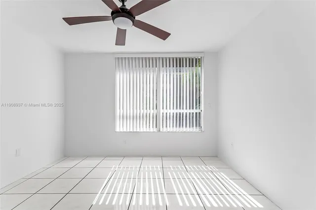 a bathroom with a shower a toilet and a shower