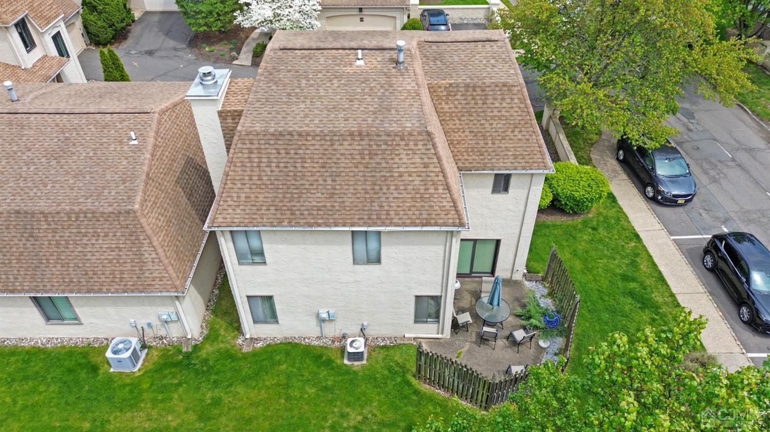 58 Gate House Lane Edison, NJ 08820 - Photo 29 of 37 front view of a house with a yard