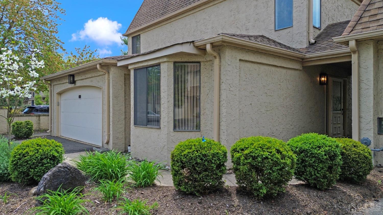 58 Gate House Lane Edison, NJ 08820 - Photo 3 of 37 a front view of a house with garden