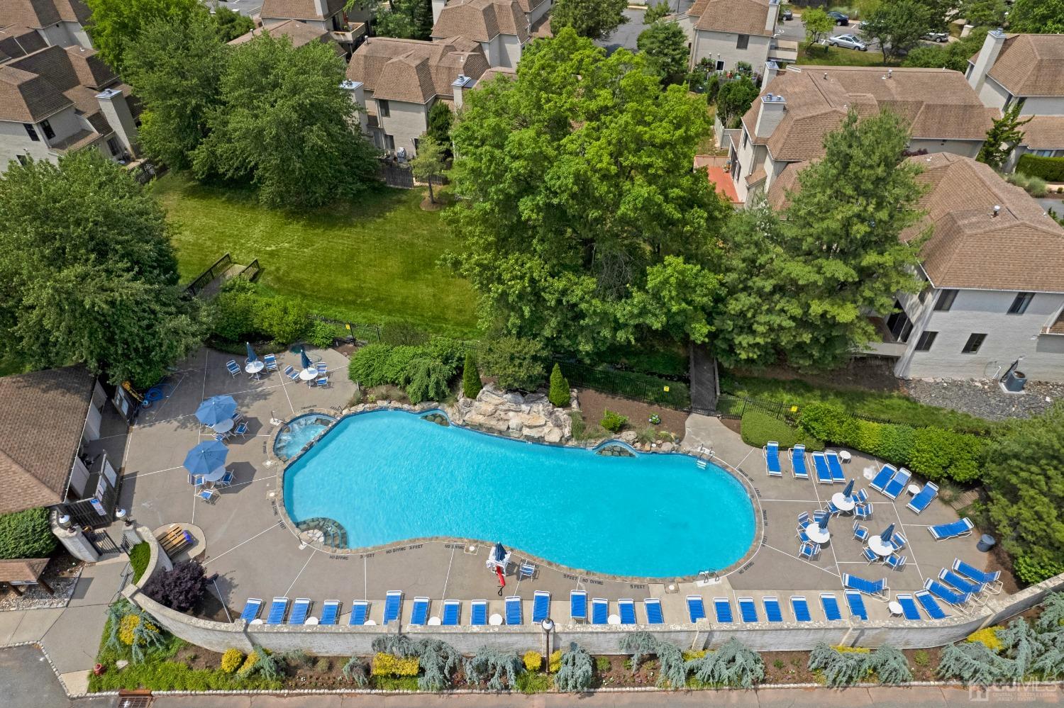 58 Gate House Lane Edison, NJ 08820 - Photo 33 of 37 an aerial view of a house with a garden and lake view