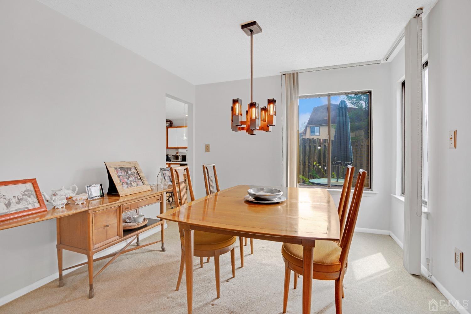 58 Gate House Lane Edison, NJ 08820 - Photo 9 of 37 a view of a dining room with furniture
