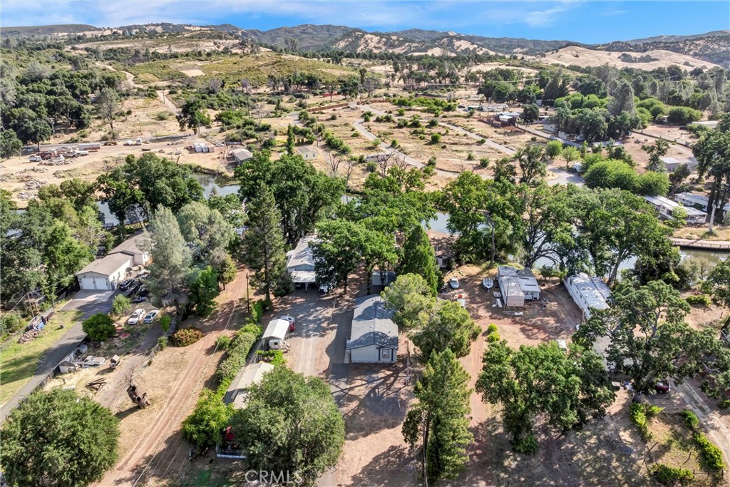 16410 Tish-A-Tang Road Lower Lake, CA 95457 - Photo 47 of 48 an aerial view of residential houses with outdoor space and trees