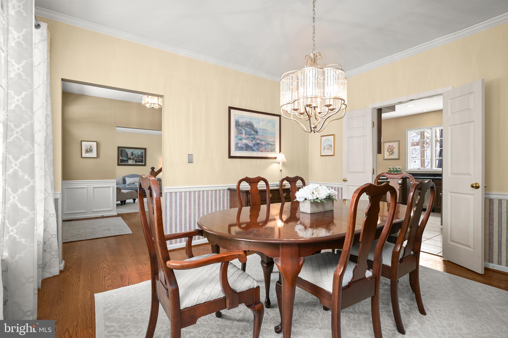 9733 Starling Road Ellicott City, MD 21042 - Photo 11 of 55 Formal dining room with crow & chair rail moulding