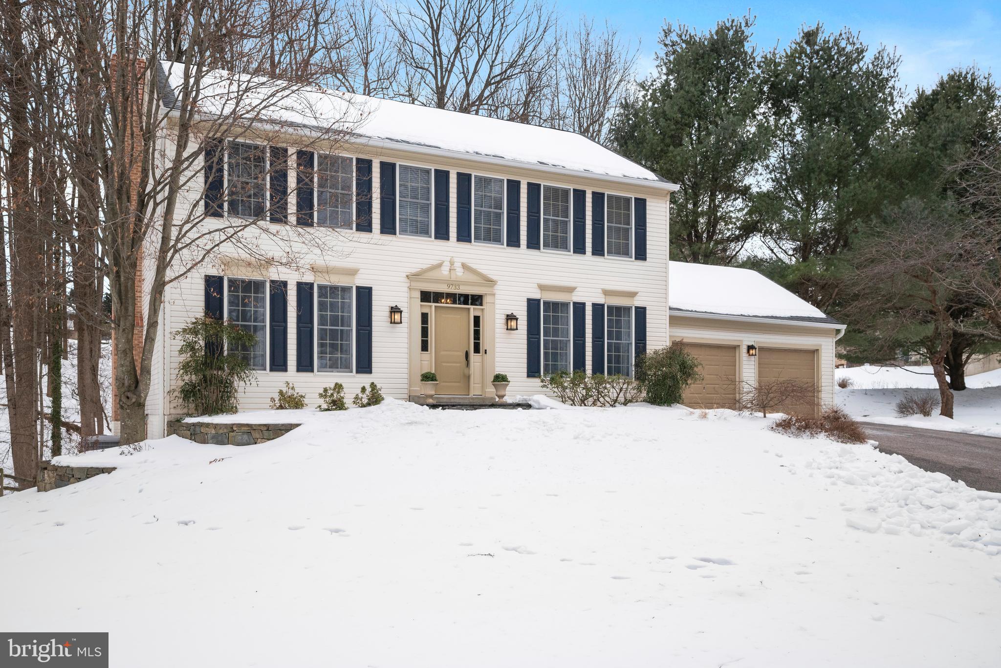 9733 Starling Road Ellicott City, MD 21042 - Photo 2 of 55 Landscaped garden beds with stone retaining walls