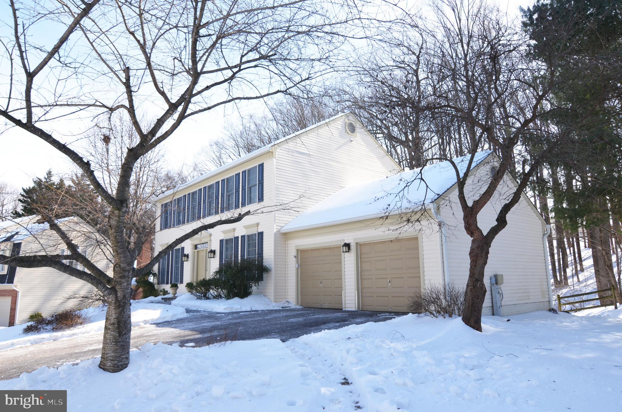 9733 Starling Road Ellicott City, MD 21042 - Photo 3 of 6 a view of a house with a snow in the yard