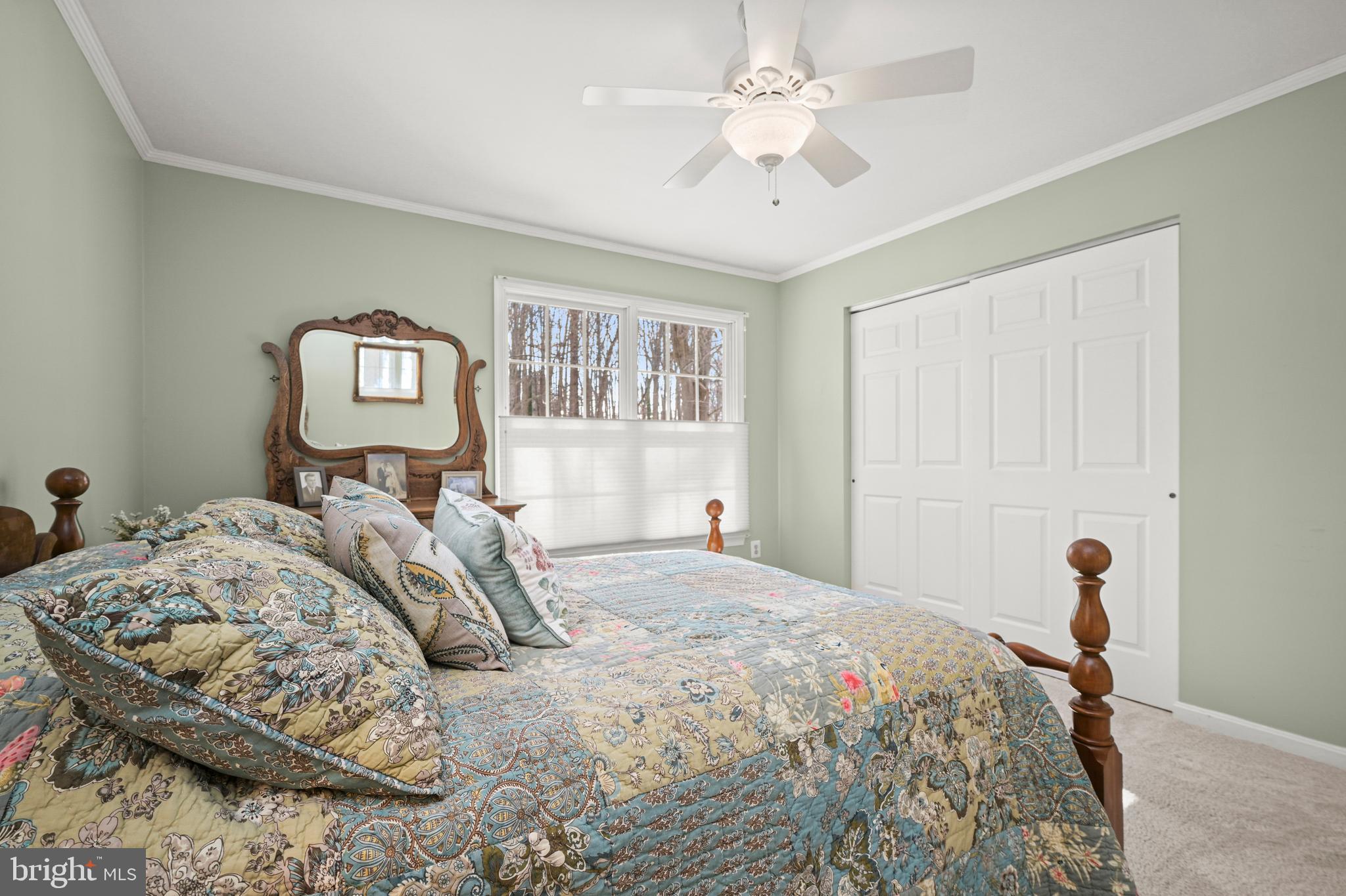 9733 Starling Road Ellicott City, MD 21042 - Photo 32 of 55 Bedroom with crown moulding & closet organizer