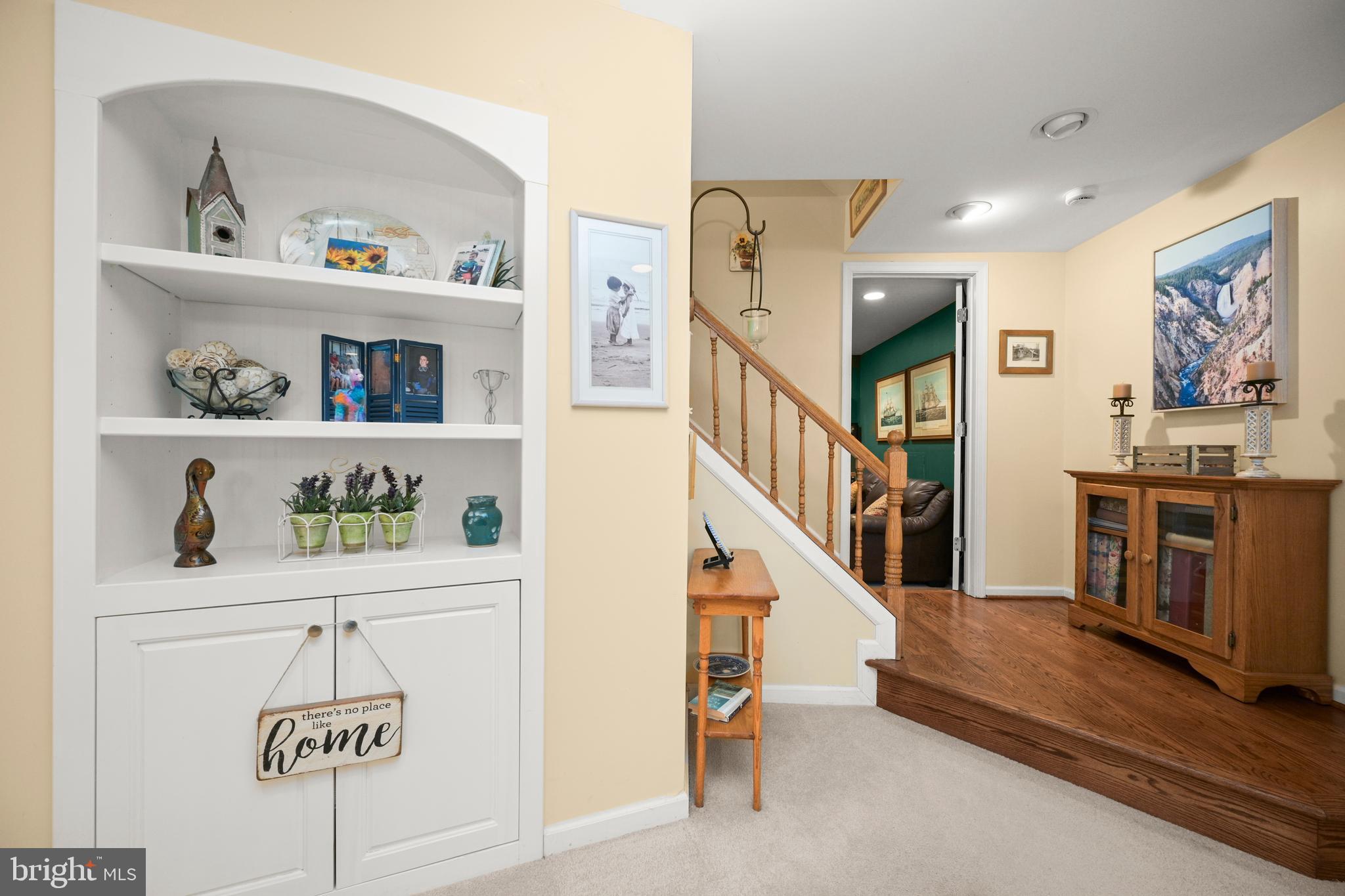 9733 Starling Road Ellicott City, MD 21042 - Photo 38 of 55 Lower level hardwood landing and built-ins