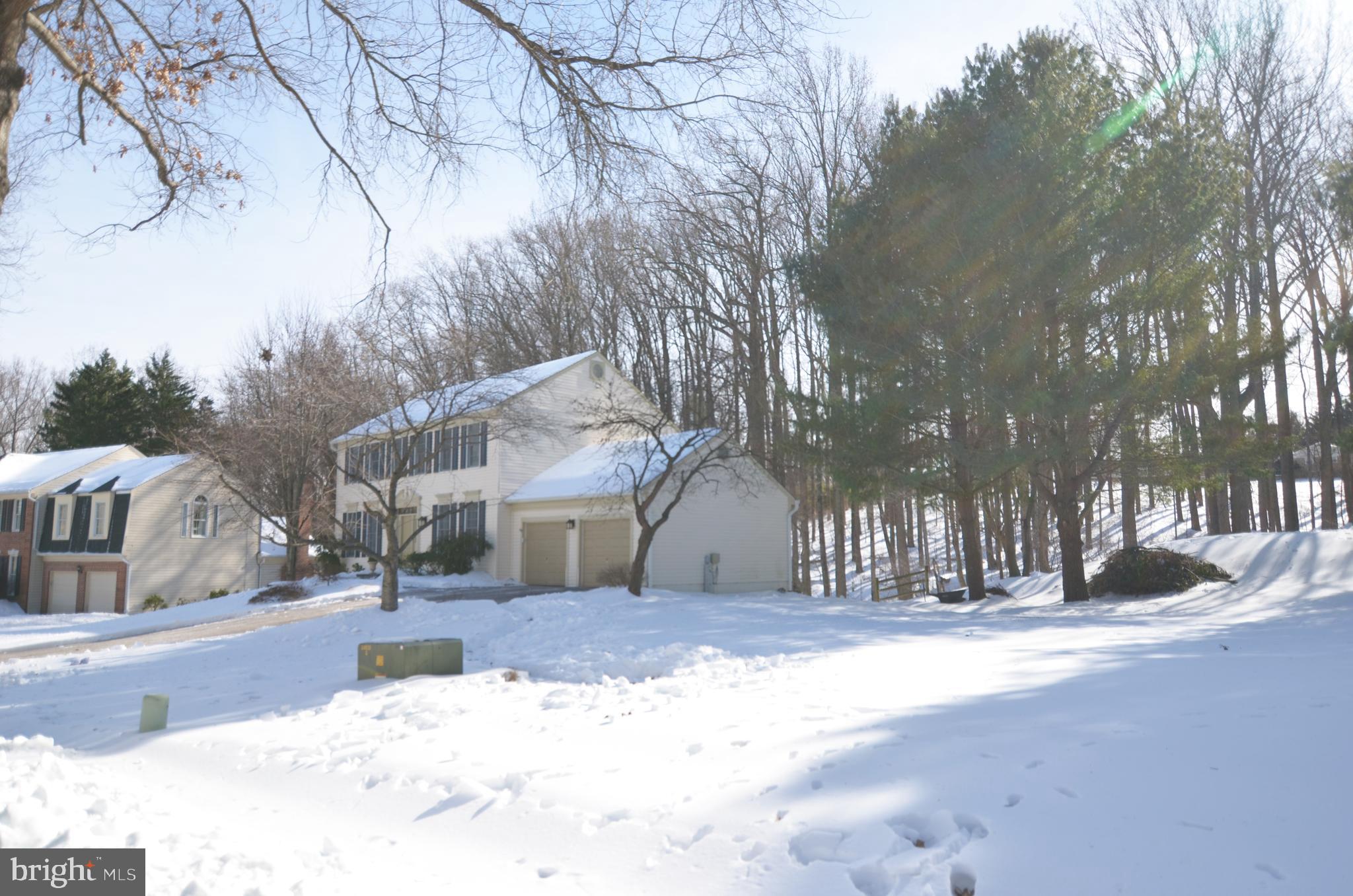 9733 Starling Road Ellicott City, MD 21042 - Photo 4 of 6 a view of road with snow on the roadside