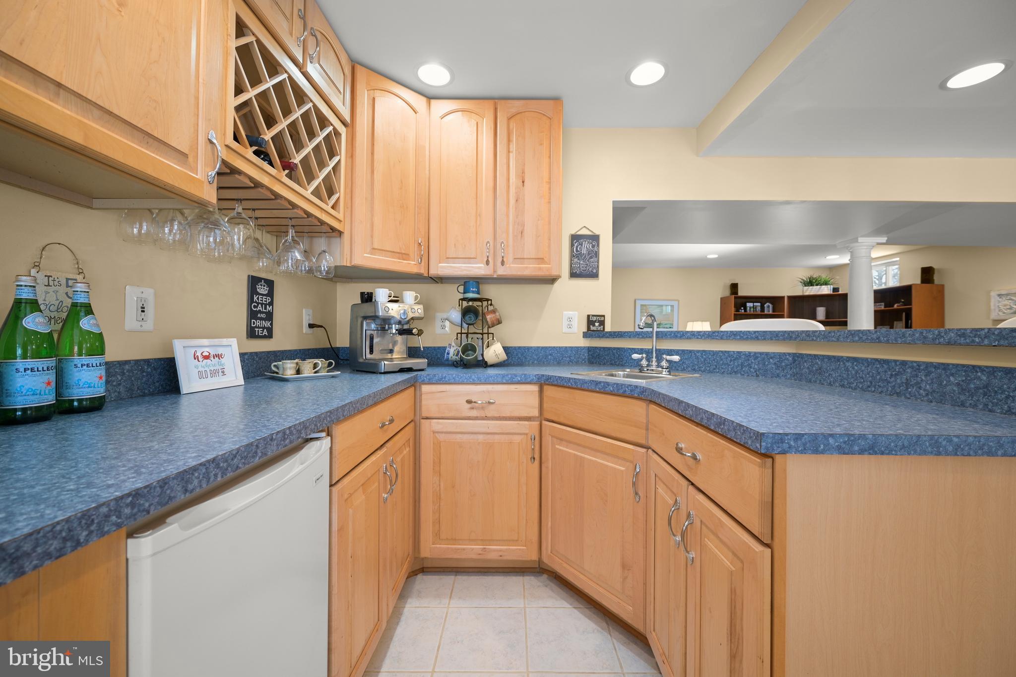 9733 Starling Road Ellicott City, MD 21042 - Photo 43 of 55 Kitchenette/wet bar with undercounter refrigerator