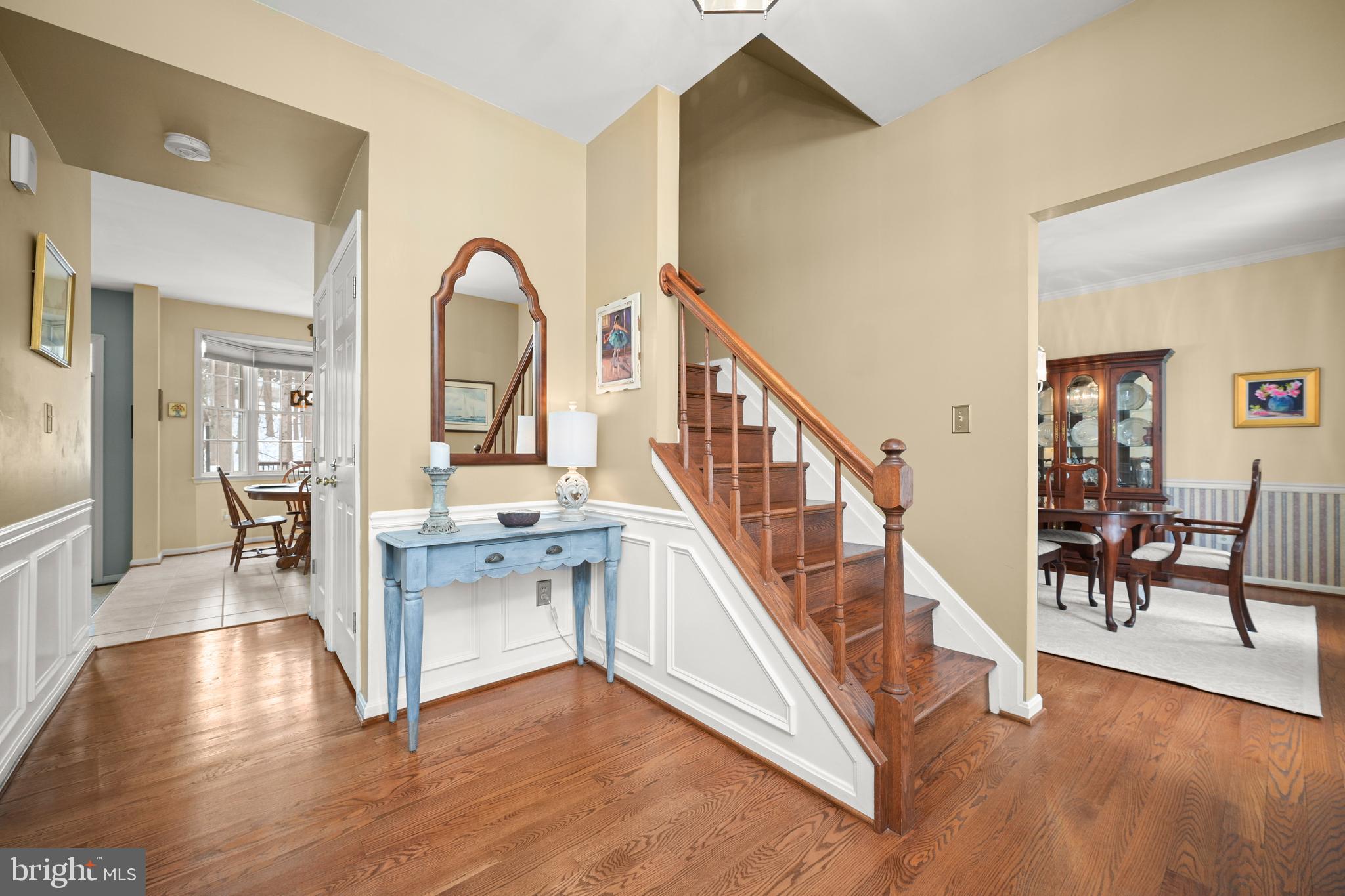 9733 Starling Road Ellicott City, MD 21042 - Photo 6 of 55 Welcoming foyer with hardwood floors & staircase