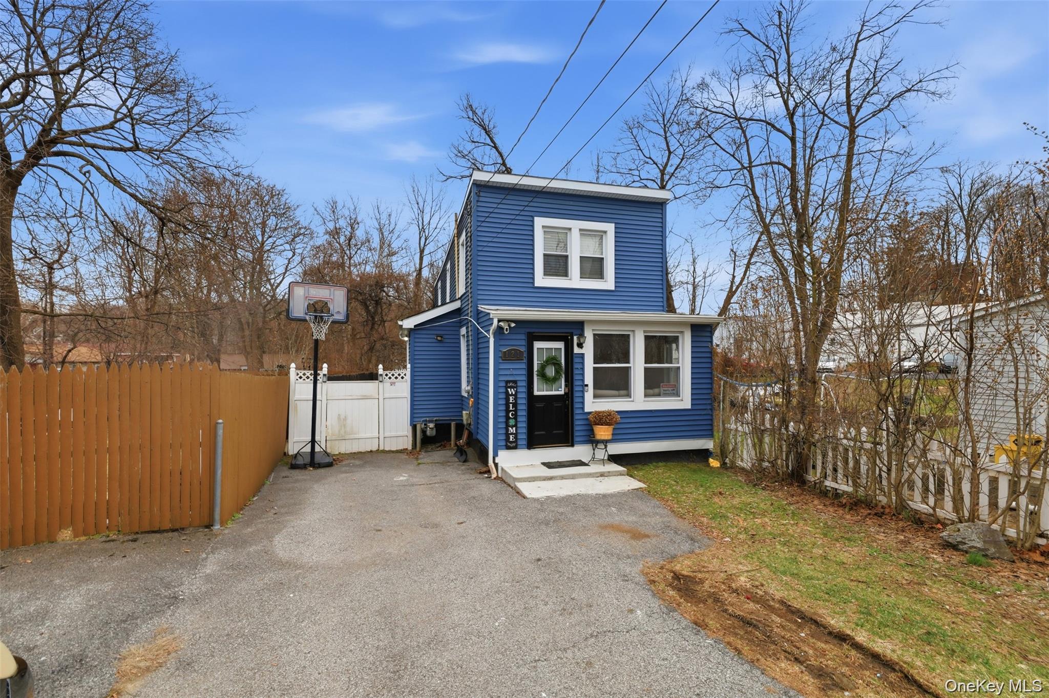 121 Little Britain Road Newburgh, NY 12550 - Photo 2 of 15 a view of a house with a large tree and a yard
