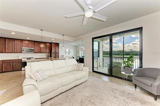 a kitchen with kitchen island a sink appliances and a counter space