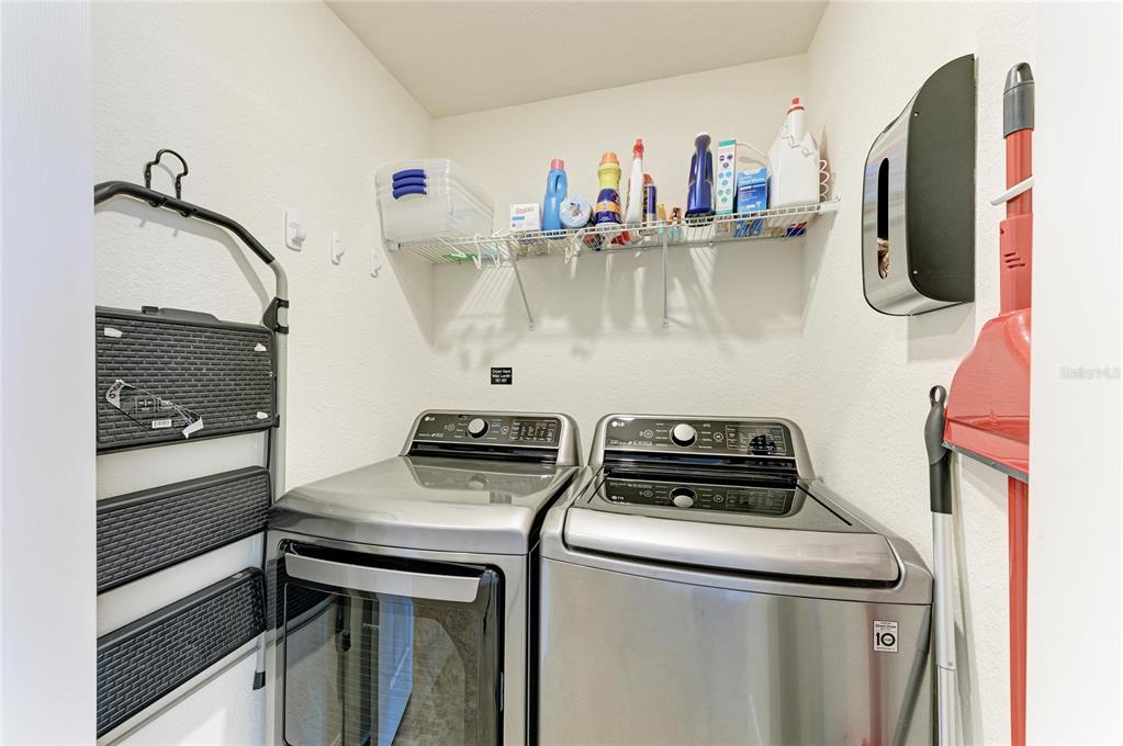 17006 Vardon Terrace, Unit 206 Lakewood Ranch, FL 34211 - Photo 33 of 79 a kitchen with a stove and a sink
