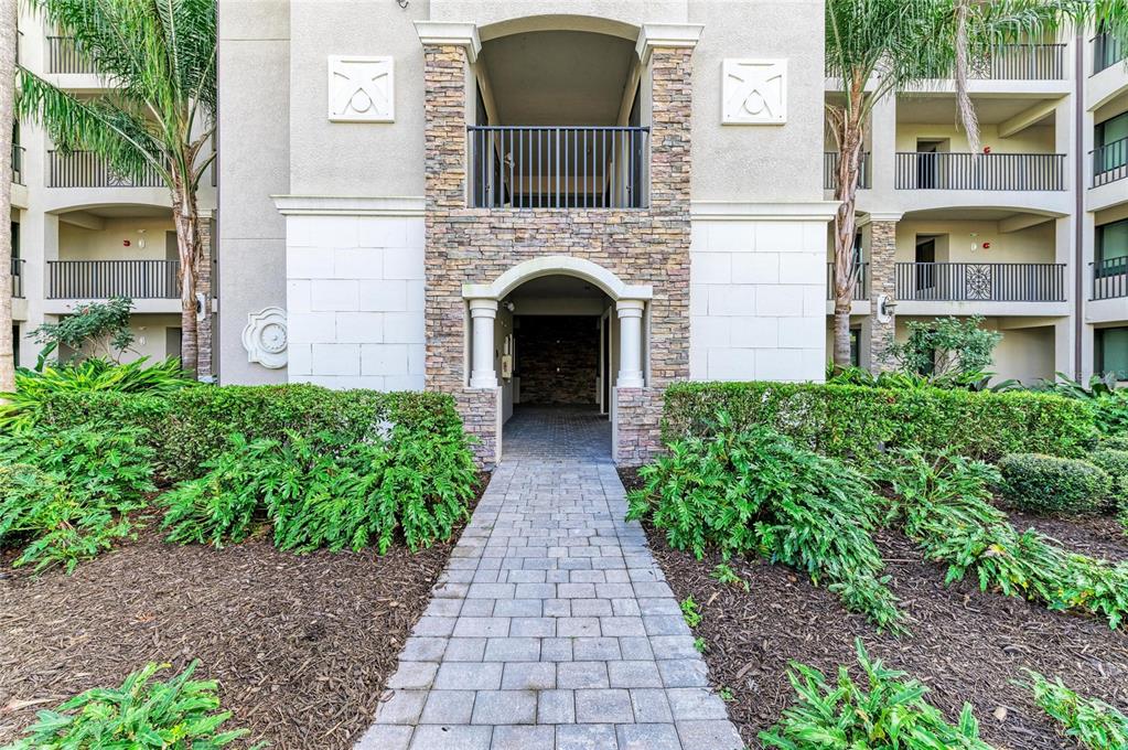 17006 Vardon Terrace, Unit 206 Lakewood Ranch, FL 34211 - Photo 37 of 79 a view of entryway and hall with wooden floor