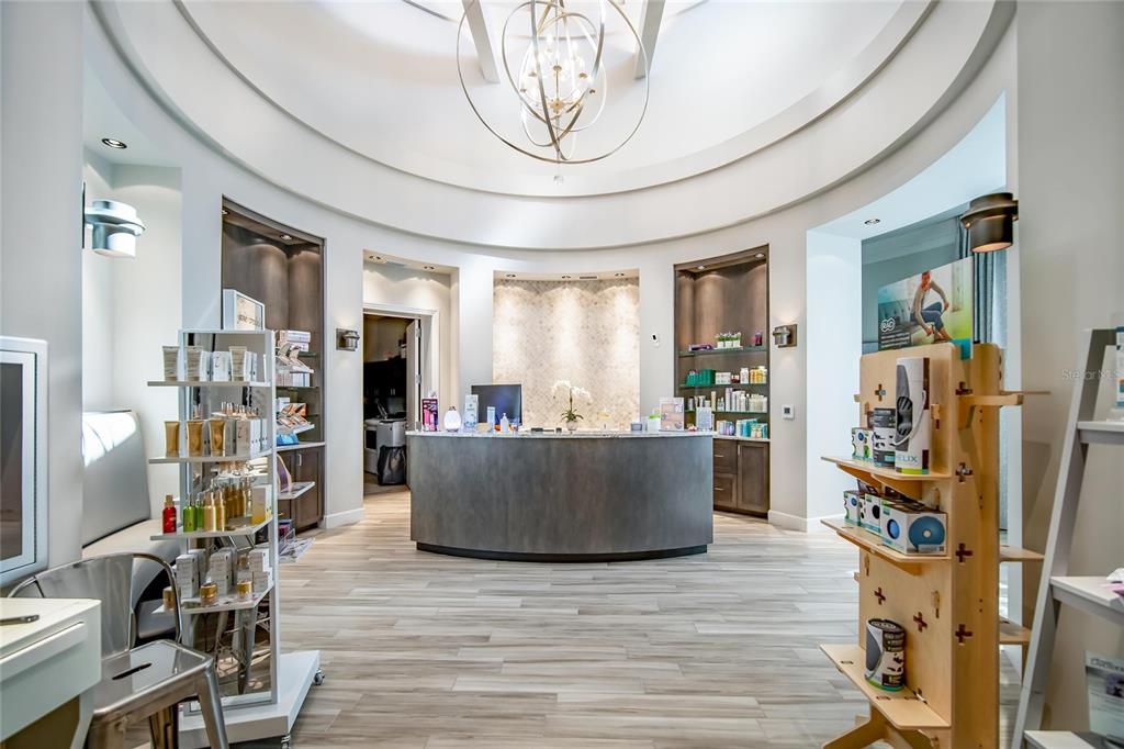 17006 Vardon Terrace, Unit 206 Lakewood Ranch, FL 34211 - Photo 68 of 79 a living room with furniture and a wooden floor