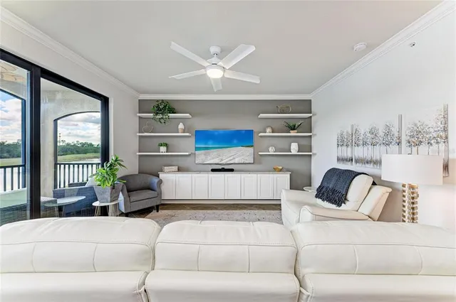 a large kitchen with kitchen island a large counter space a sink stainless steel appliances and cabinets