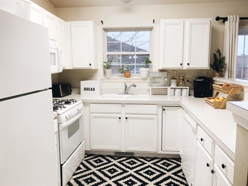 2367 Chelsea Road Northbrook, IL 60062 - Photo 3 of 7 a kitchen with a sink stove and cabinets