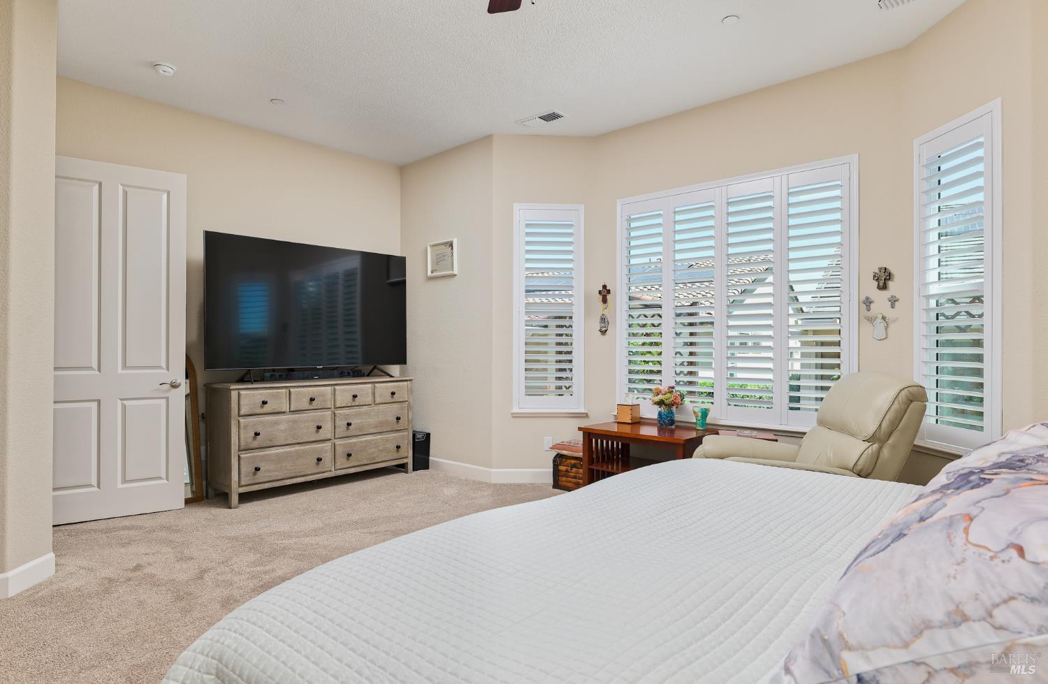 278 Longspur Drive Rio Vista, CA 94571 - Photo 22 of 29 a bedroom with a bed and a flat screen tv