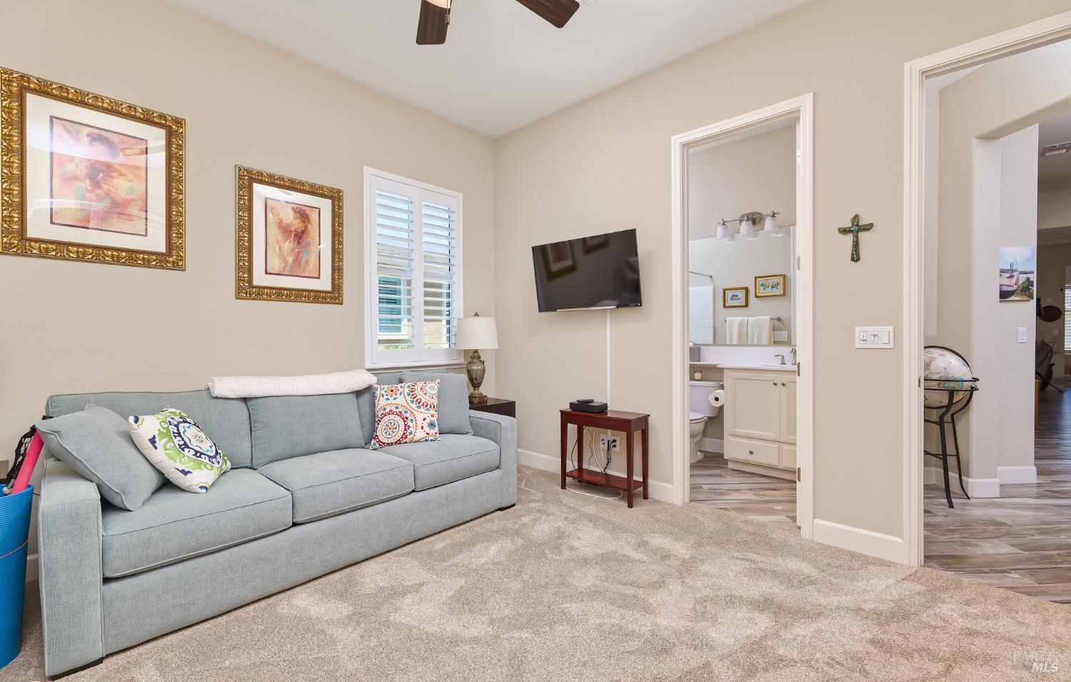 278 Longspur Drive Rio Vista, CA 94571 - Photo 27 of 29 a living room with furniture and a flat screen tv