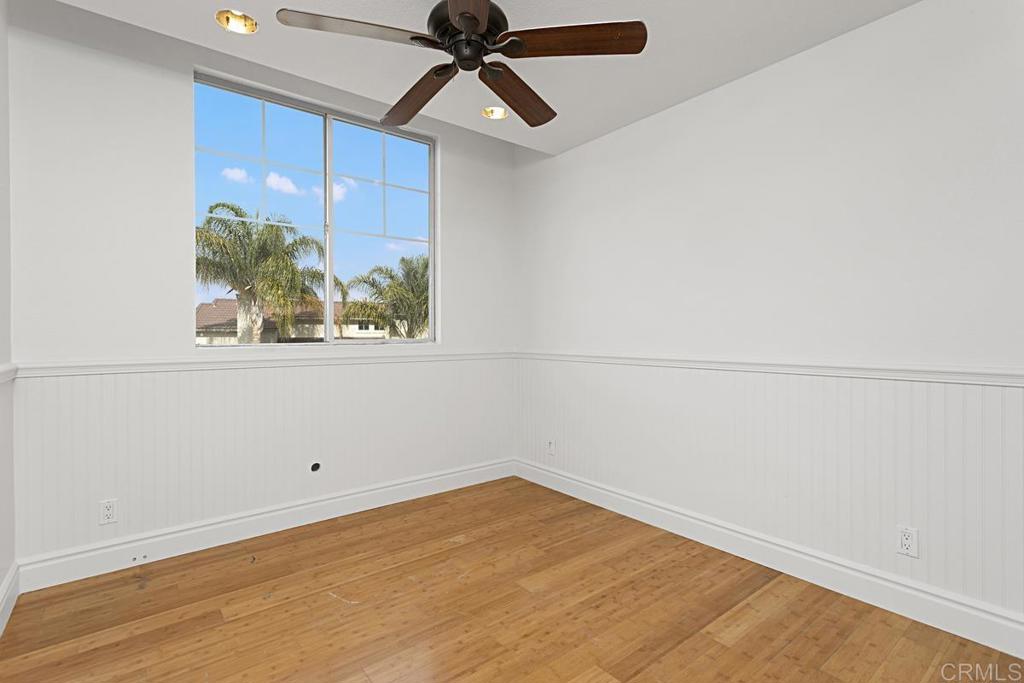 27611 Marian Road Temecula, CA 92591 - Photo 7 of 13 an empty room with windows and fan