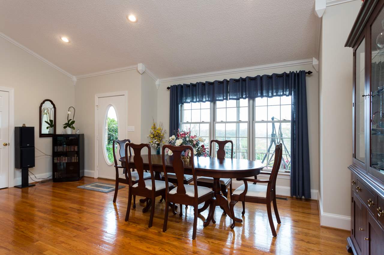 1619 Middlebrook Road Staunton, VA 24401 - Photo 3 of 42 a view of a a dining room with furniture window and wooden floor
